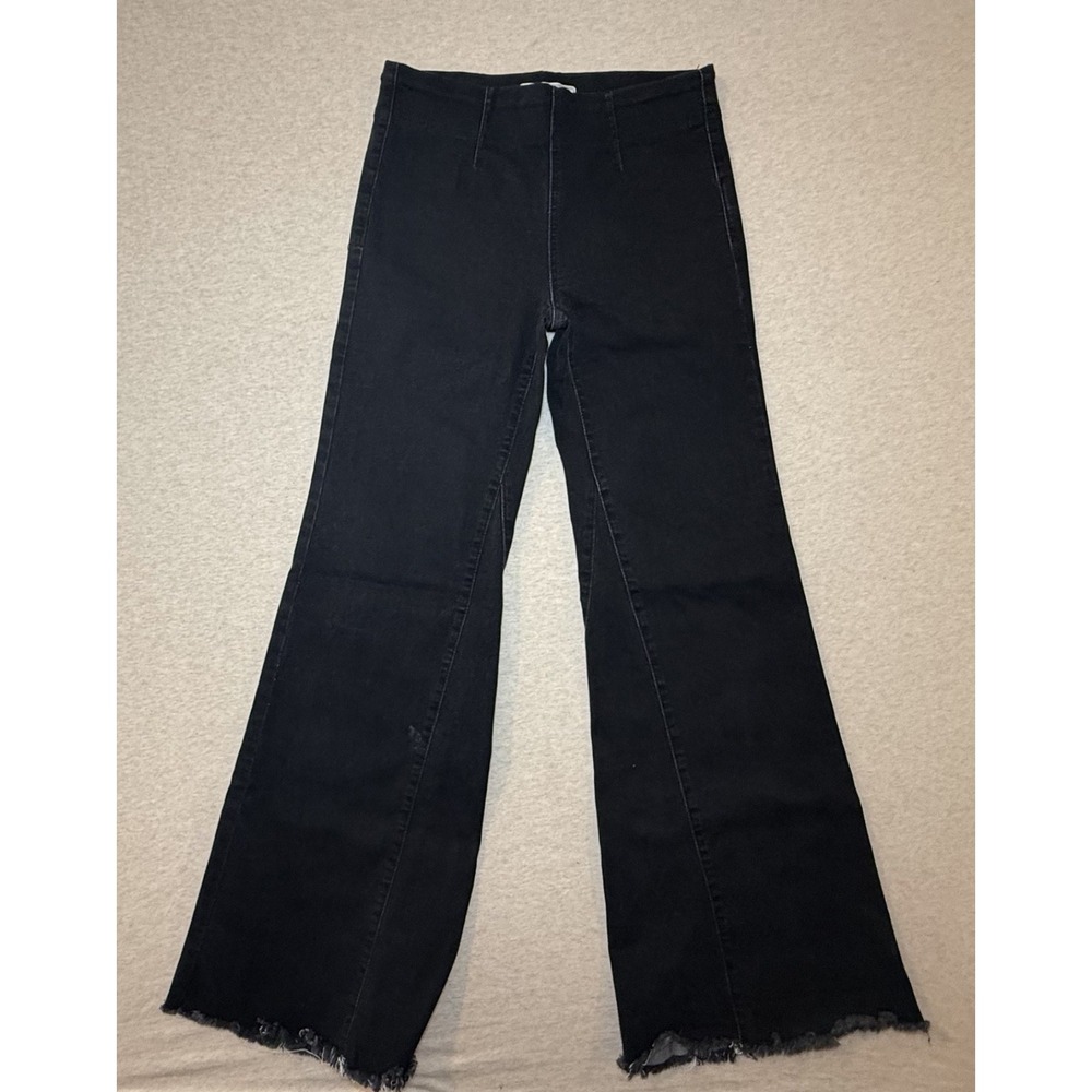 Free People. Black strech denim. bell bottoms. size 26